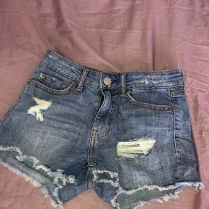 High waisted light wash denim shorts with rips
